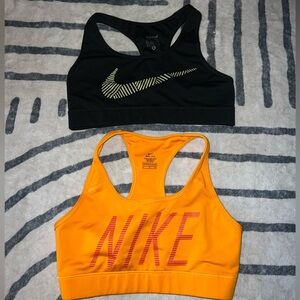 Nike Dri-FIT Black and Orange Sports Bras
